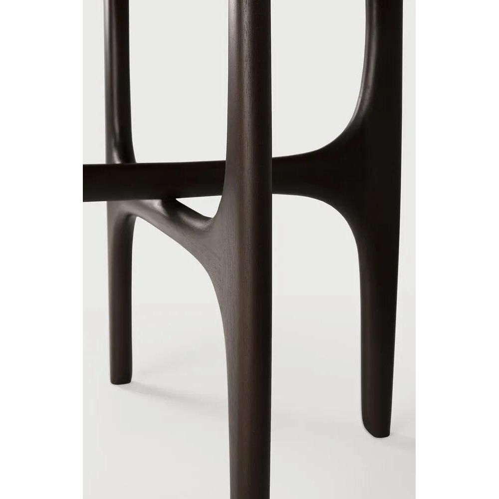 Featuring PI Side Table by Ethnicraft at Amethyst Home. The PI collection honors nature’s design, by keeping the strength, curves, and lines, as nature intended. Interesting shapes are discovered in this sleek and stylish, polished imperfect, finish. Each PI side table is finished by hand to ensure that the individual character of the wood is respected. Amethyst Home provides interior design, new home construction design consulting, vintage area rugs, and lighting in the Salt Lake City metro area.