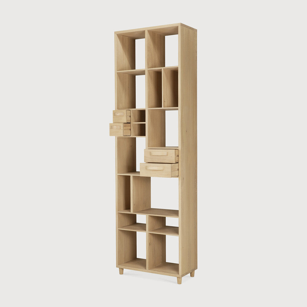 Playful yet somber, the 60s-inspired Pirouette bookrack is a functional storage space that doubles as a statement piece. Amethyst Home provides interior design, new home construction design consulting, vintage area rugs, and lighting in the Austin metro area.