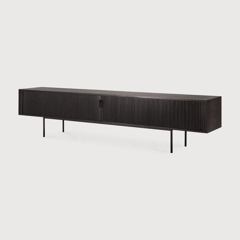 Featuring Roller Max TV Cupboard Teak Black XL by Ethnicraft at Amethyst Home. The Roller Max collection is remarkable in its design, distinguished with its stacked wood-stick effect. The TV cupboard offers functional storage in an eye-catching design, resulting in an elegant and sophisticated item for both residential and commercial spaces.
Overall Dimensi. Amethyst Home provides interior design, new home construction design consulting, vintage area rugs, and lighting in the Charlotte metro area.