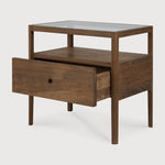 Featuring Spindle Bedside Table Reclaimed Teak by Ethnicraft at Amethyst Home. With its one drawer, open space and slightly tapered legs, the Spindle bedside table is the perfect no-nonsense companion for the striking Spindle bed. Reclaimed teak offers a truly unique finish for each and every item — the origin of each hand-finished piece of furniture carries i. Amethyst Home provides interior design, new home construction design consulting, vintage area rugs, and lighting in the Boston metro area.