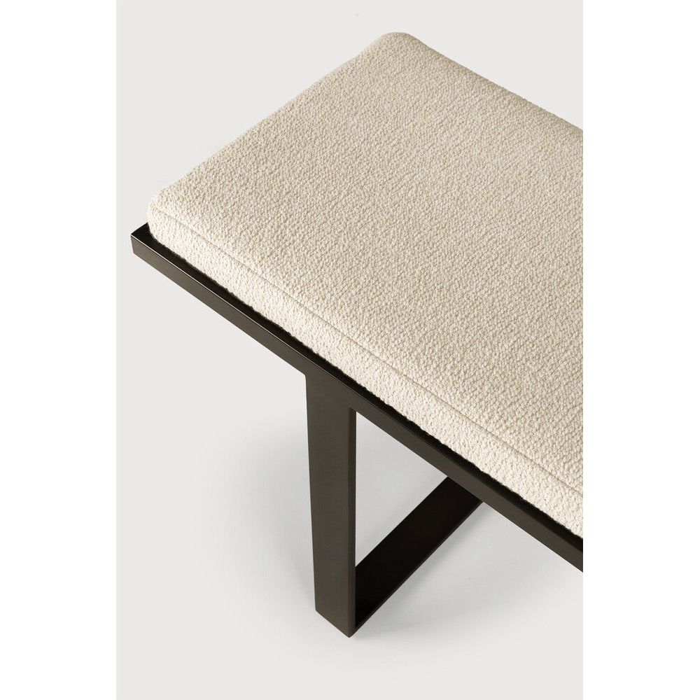 Strong and simple lines form the basis of the Stability. Intrigue comes with the thickness of the upholstered cushion top revealing a contrast with the airy metal base. As with all benches, these practical items can stand alone in a range of spaces or pair with a dining table for practical seating. Amethyst Home provides interior design, new home construction design consulting, vintage area rugs, and lighting in the Charlotte metro area.