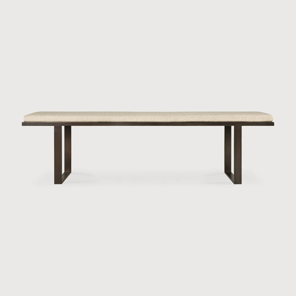 Strong and simple lines form the basis of the Stability. Intrigue comes with the thickness of the upholstered cushion top revealing a contrast with the airy metal base. As with all benches, these practical items can stand alone in a range of spaces or pair with a dining table for practical seating. Amethyst Home provides interior design, new home construction design consulting, vintage area rugs, and lighting in the Tampa metro area.