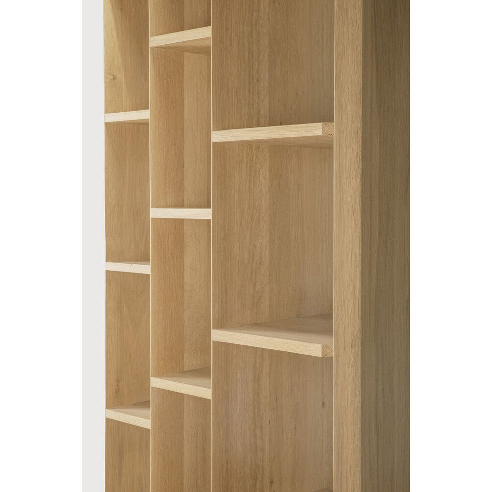 Featuring Stairs Rack Oak by Ethnicraft at Amethyst Home. An angular composition, designed by Alain van Havre, forms the heart of a design that aims to distance itself from traditional static and immobile surfaces. By perfectly aligning multiple angles, a unique sense of volume is created. When we then add light to the equation, the multi-faceted oak canvas cre. Amethyst Home provides interior design, new home construction design consulting, vintage area rugs, and lighting in the Miami metro area.
