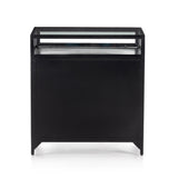 Featuring Shadow Box Nightstand by Four Hands at Amethyst Home. This Shadow Box Nightstand is finished in a gorgeous matte black. We love that the glass top allows you to showcase your favorite jewelry or family keepsake, while the two spacious drawers give you storage space. The knobs are finished in bronze to give this piece a sleek contrast. 
Overall Dimen.  Amethyst Home provides interior design, new home construction design consulting, vintage area rugs, and lighting in the Austin metro area.