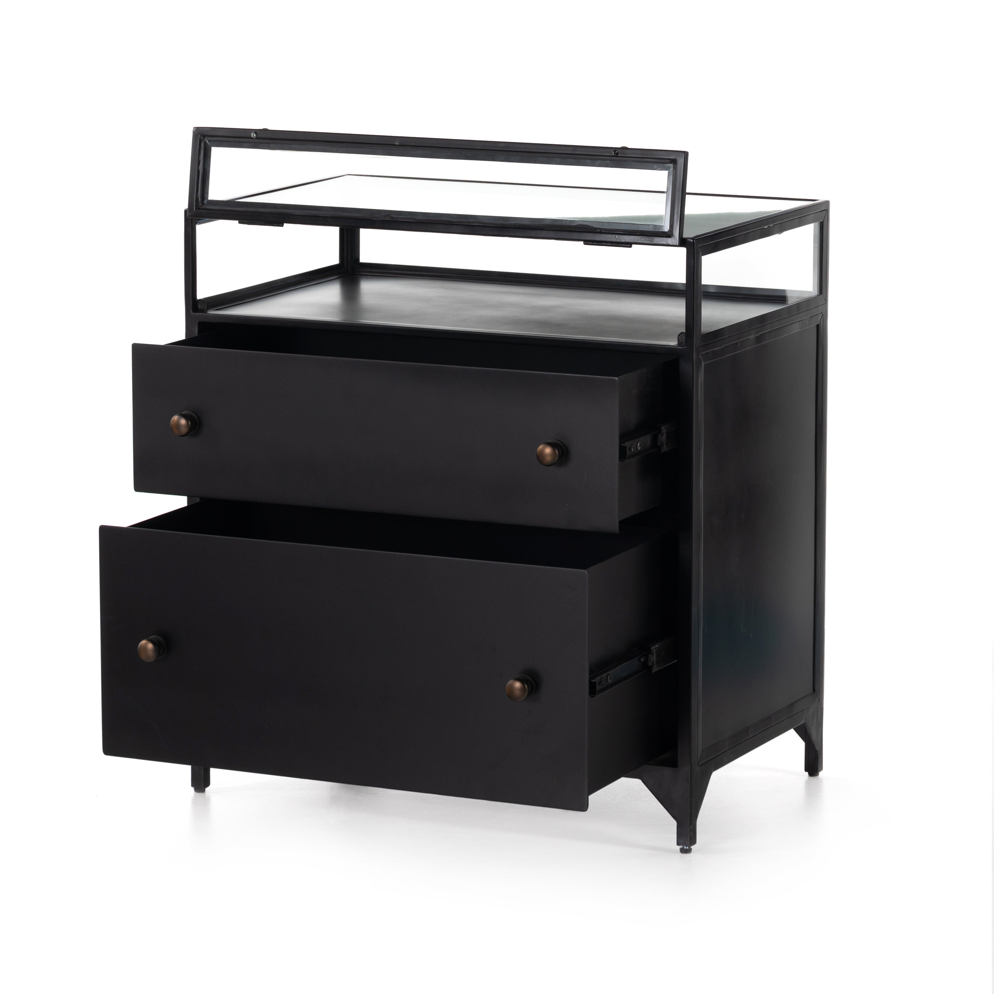 This Shadow Box Nightstand is finished in a gorgeous matte black. We love that the glass top allows you to showcase your favorite jewelry or family keepsake, while the two spacious drawers give you storage space. The knobs are finished in bronze to give this piece a sleek contrast.  Overall Dimensions: 28.00"w x 17.75"d x 30.00"h Materials: Iron, Tempered Glass, Glass