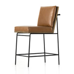 Crisp and clean, with natural panache. Slim, black-finished iron frames a floating ladderback of amber-finished oak and faux leather seating. Rear handle detail adds a fashionable finishing touch. Amethyst Home provides interior design, new home construction design consulting, vintage area rugs, and lighting in the Alpharetta metro area.