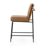 Crisp and clean, with natural panache. Slim, black-finished iron frames a floating ladderback of amber-finished oak and faux leather seating. Rear handle detail adds a fashionable finishing touch. Amethyst Home provides interior design, new home construction design consulting, vintage area rugs, and lighting in the Portland metro area.