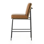 Crisp and clean, with natural panache. Slim, black-finished iron frames a floating ladderback of amber-finished oak and faux leather seating. Rear handle detail adds a fashionable finishing touch. Amethyst Home provides interior design, new home construction design consulting, vintage area rugs, and lighting in the Seattle metro area.