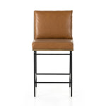 Crisp and clean, with natural panache. Slim, black-finished iron frames a floating ladderback of amber-finished oak and faux leather seating. Rear handle detail adds a fashionable finishing touch. Amethyst Home provides interior design, new home construction design consulting, vintage area rugs, and lighting in the Washington metro area.