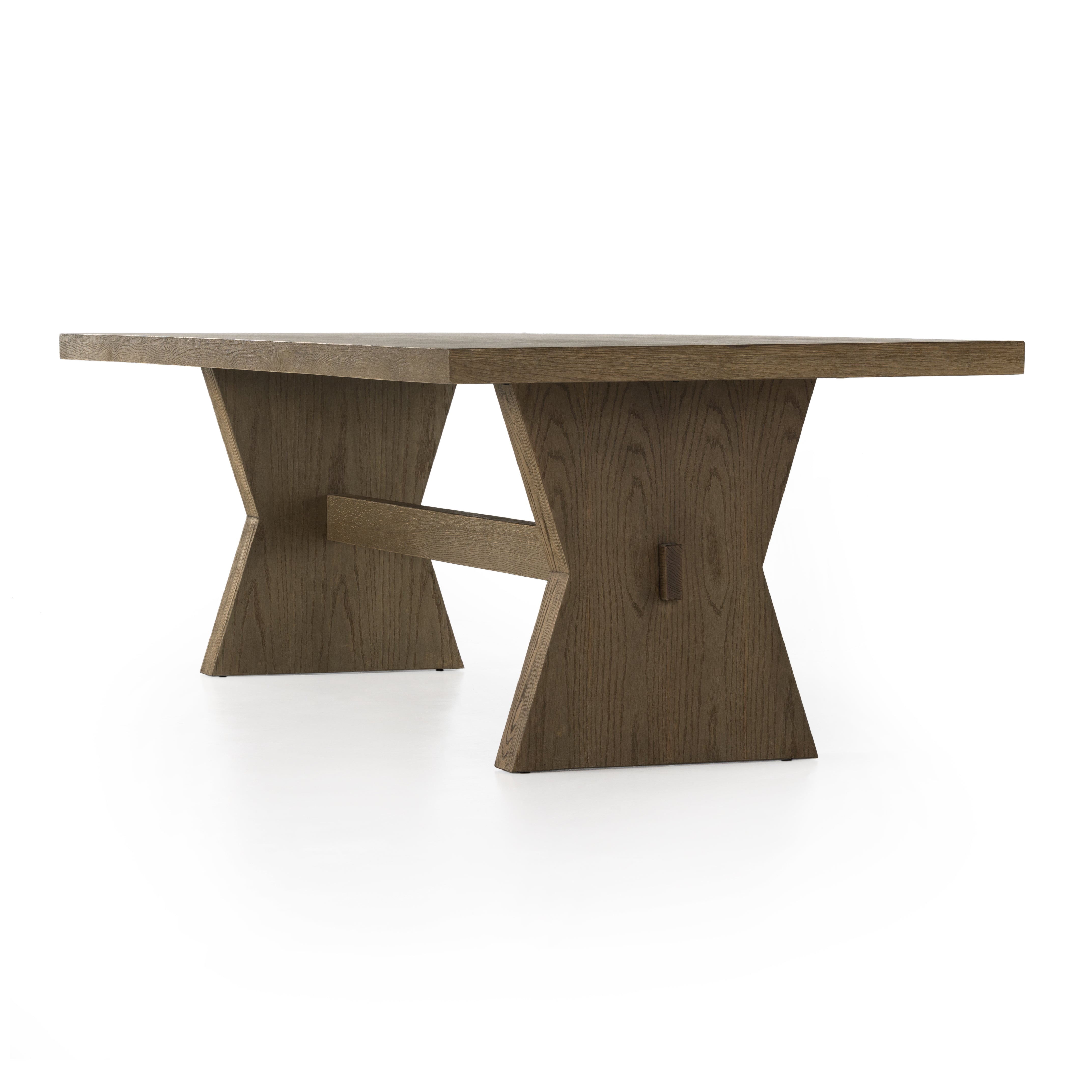 Inspired by European antiques, grand scaling and bowtie-shaped legs serve plenty of presence. A single stretcher adds a traditional feel to this refreshed altar table. Amethyst Home provides interior design, new home construction design consulting, vintage area rugs, and lighting in the Portland metro area.