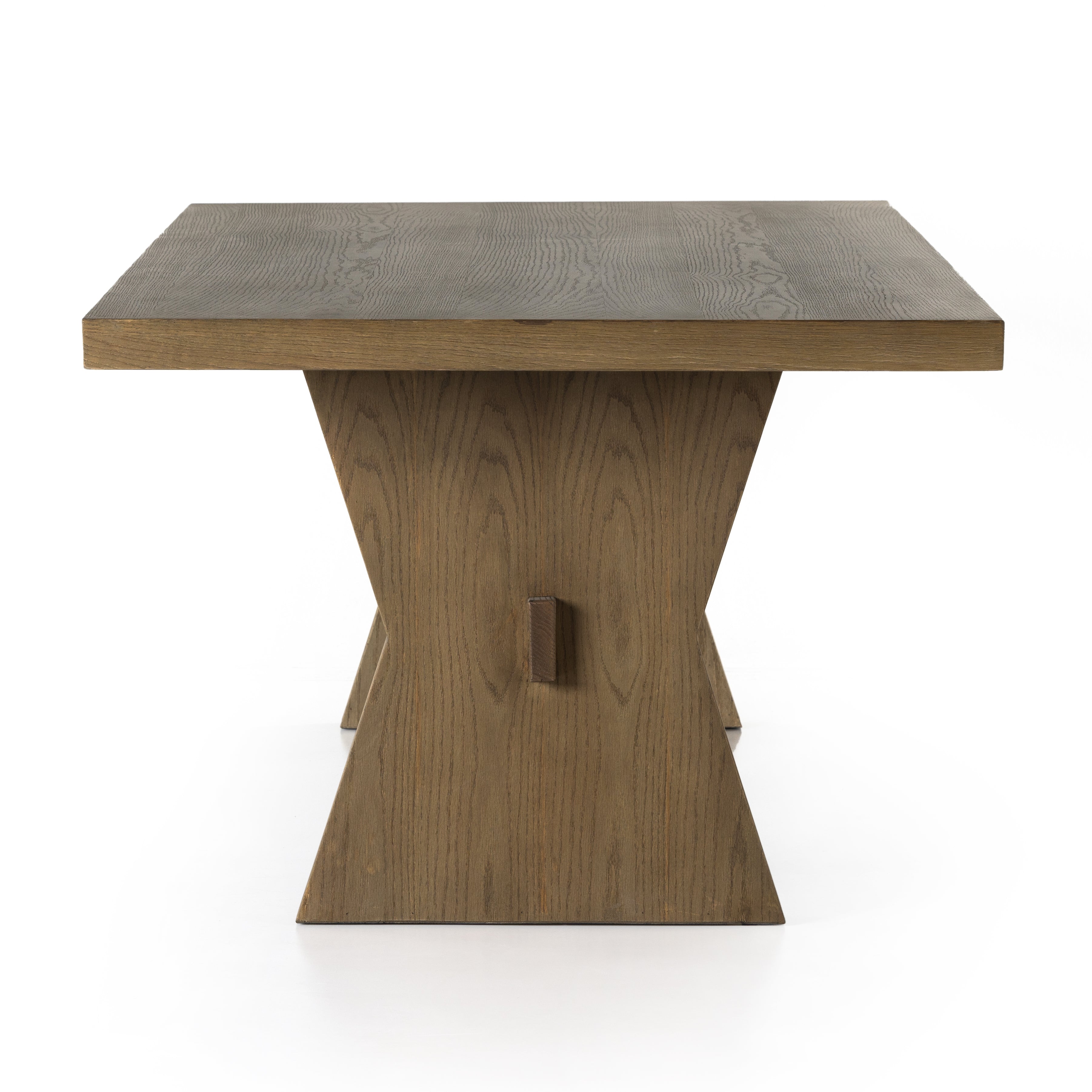 Inspired by European antiques, grand scaling and bowtie-shaped legs serve plenty of presence. A single stretcher adds a traditional feel to this refreshed altar table. Amethyst Home provides interior design, new home construction design consulting, vintage area rugs, and lighting in the Seattle metro area.
