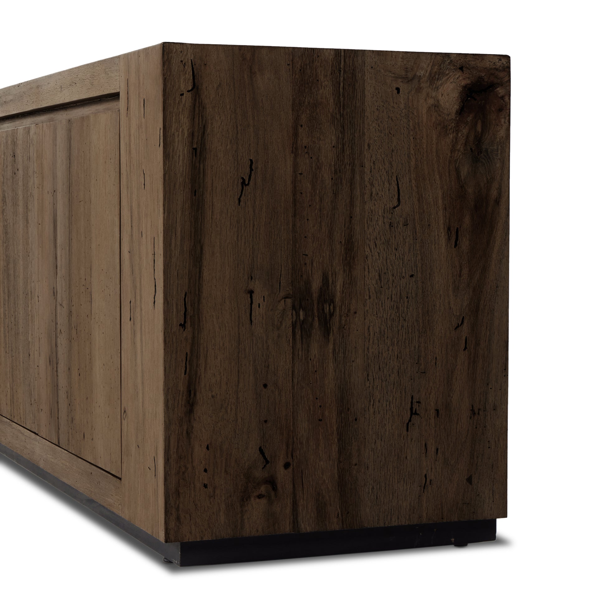 Made from thick-cut oak veneer with a faux rustic finish made to emulate wormwood, this spacious media console features chunky squared legs and dovetail joinery detailing. Amethyst Home provides interior design, new home construction design consulting, vintage area rugs, and lighting in the Houston metro area.