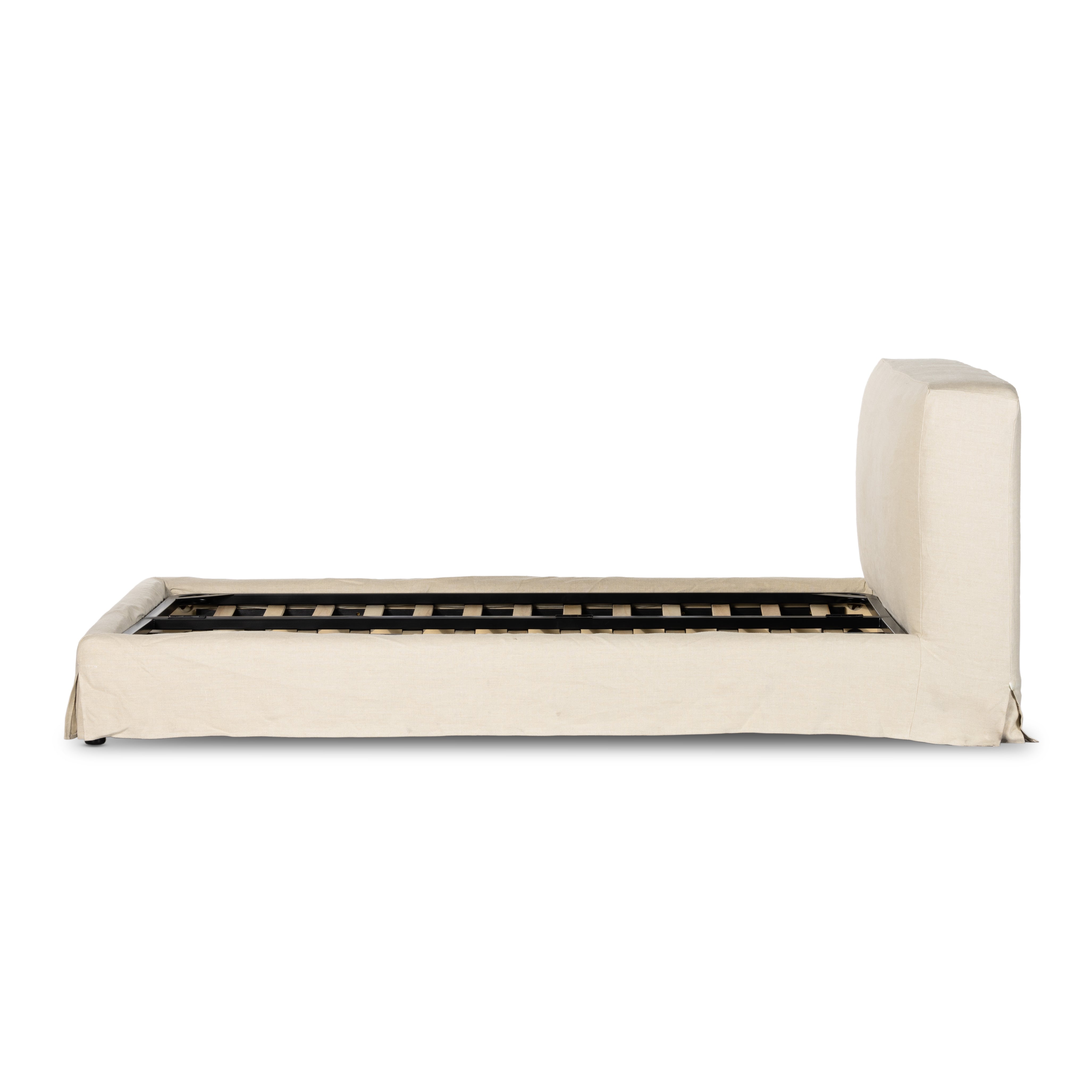 Crafted for comfort. A low, slipcovered bed features luxurious and sustainably made Belgian linen. Durable and soft to the touch, Libecoâ„¢-sourced linens and linen blends are artisan-made without toxic chemicals. Slipcovered styles are fully removable and machine-washable for easy care. Amethyst Home provides interior design, new construction, custom furniture and area rugs in the Calabasas metro area