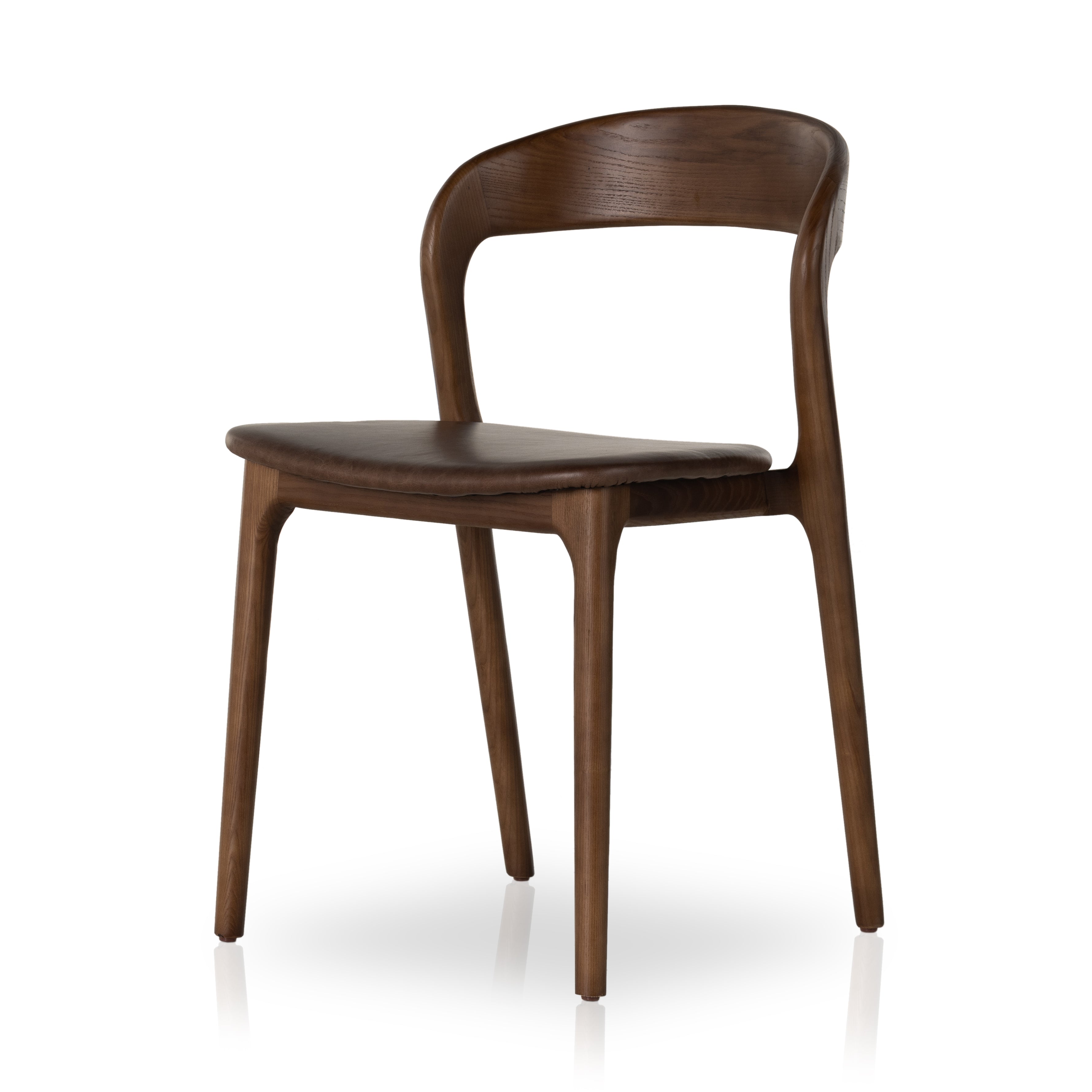 Inspired by clean, simple Scandinavian styling, solid ash forms a shapely, open frame for tan top-grain leather seating in a monochromatic tone. Amethyst Home provides interior design, new construction, custom furniture, and area rugs in the Winter Garden metro area.