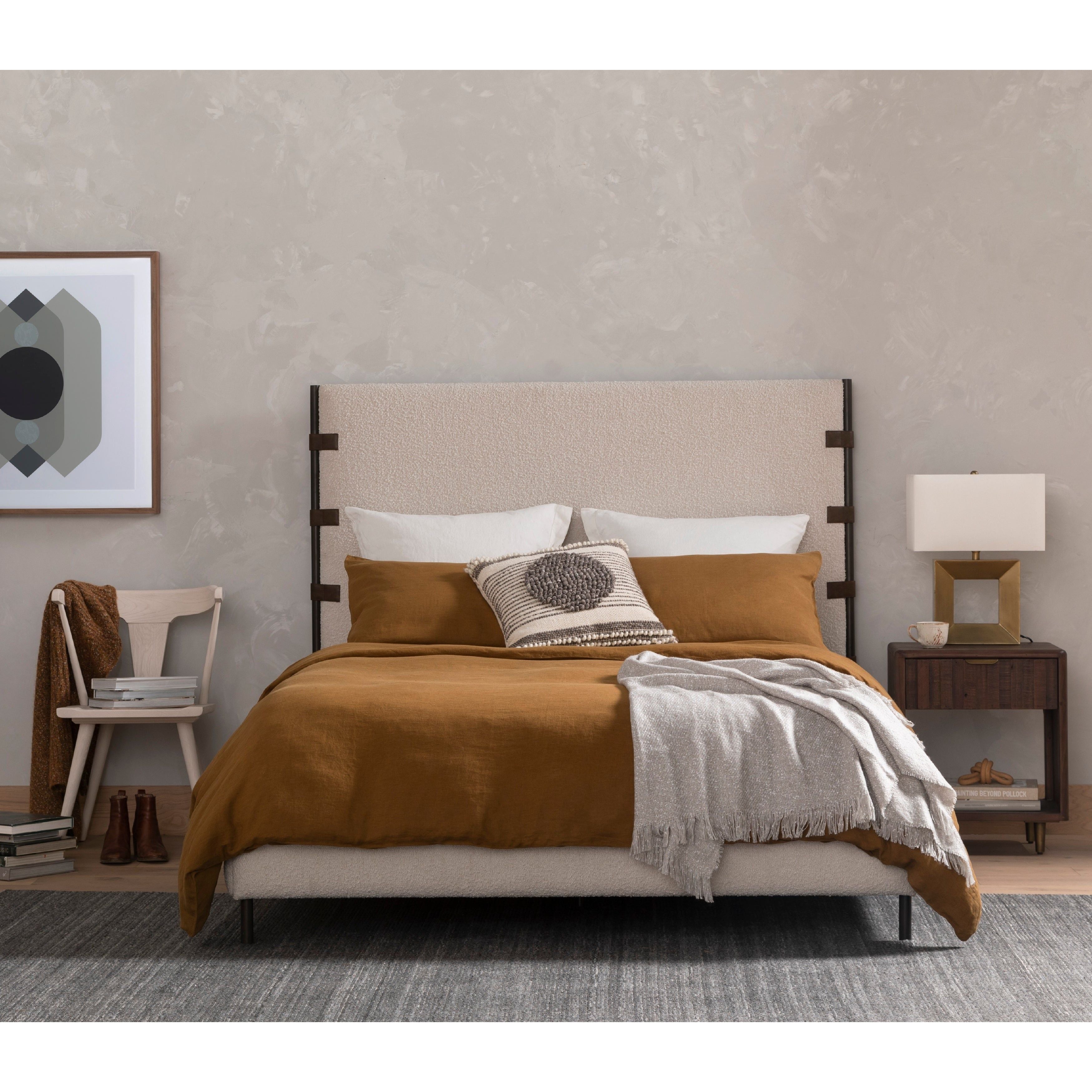 Bring texture into play. Upholstered in a classic cream-colored boucle, with decorative leather straps adding a material-driven touch with contrast. Standard box spring required. Amethyst Home provides interior design services, furniture, rugs, and lighting in the Alpharetta metro area.