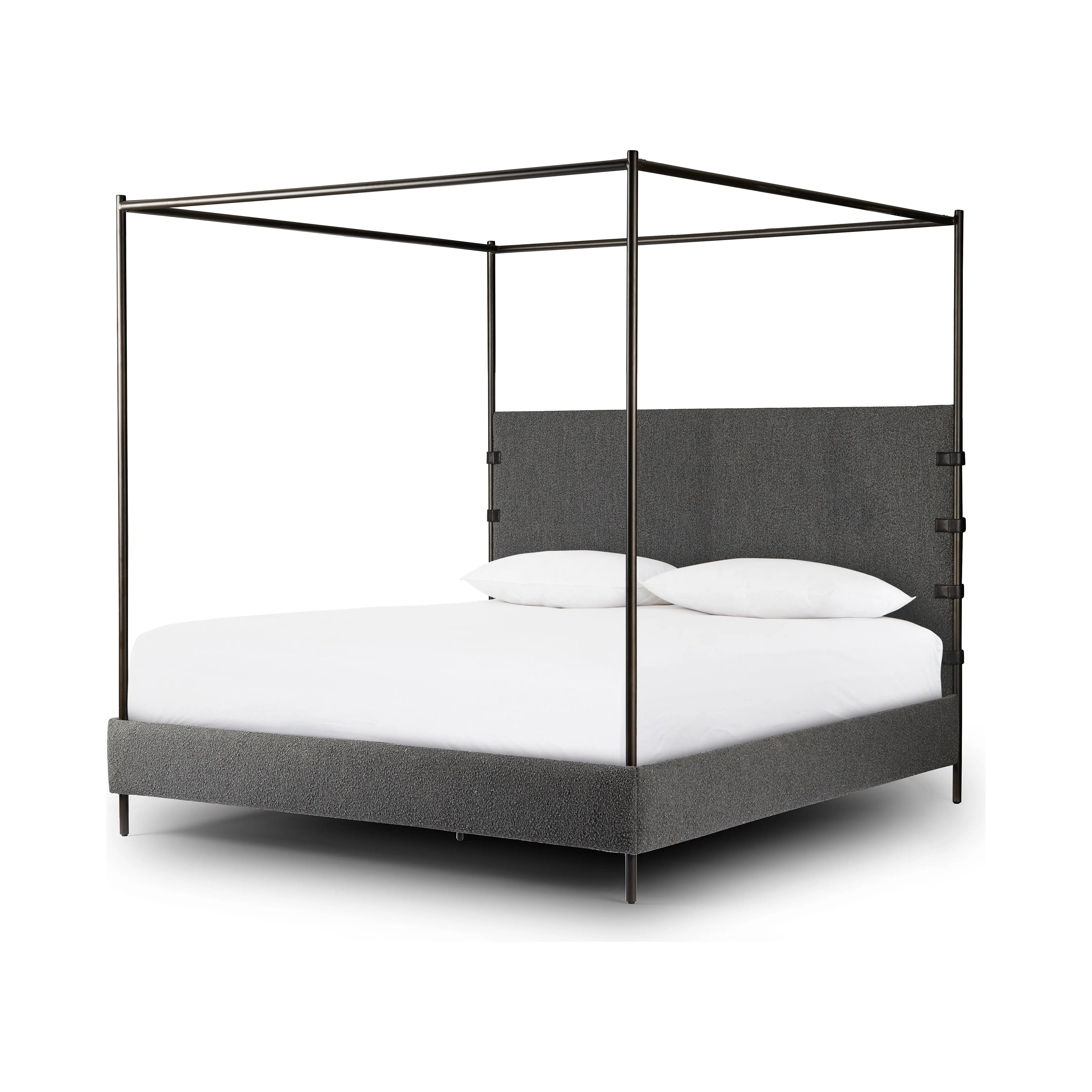 Bring texture into play. This iron canopy bed features a headboard upholstered in a classic boucle fabric with decorative leather straps for a material-driven contrast. Standard box spring required. This bed is not compatible with an adjustable mattress.Collection: Irondal Amethyst Home provides interior design, new home construction design consulting, vintage area rugs, and lighting in the Alpharetta metro area.