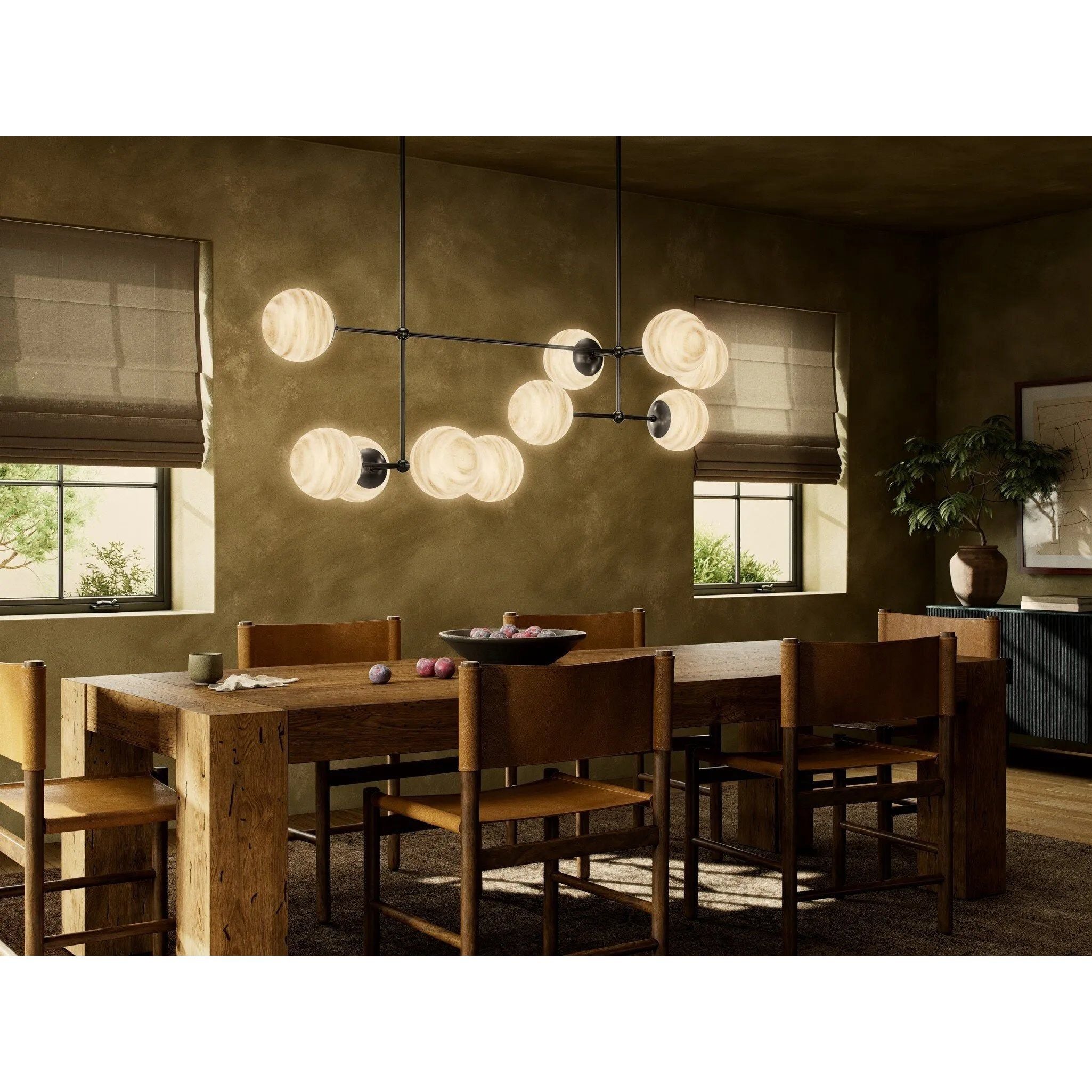 Featuring Armstrong Black Gunmetal Marbled Matte Glass Linear Chandelier by Four Hands at Amethyst Home. Marbled glass spheres seem to extend and reach across smooth brass rods. Each globe is individually blown, shaped and sculpted by hand through a one-hour process. The finish on the brass frame is achieved through a specialized process that turns the bras. Amethyst Home provides interior design, new home construction design consulting, vintage area rugs, and lighting in the Calabasas metro area.
