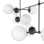 Featuring Armstrong Black Gunmetal Opal Matte Glass Linear Chandelier by Four Hands at Amethyst Home. Matte glass spheres seem to extend and reach across smooth brass rods. Each globe is individually blown, shaped and sculpted by hand through a one-hour process. Matte globes are specially manufactured to evenly diffuse light. The finish on the brass frame i. Amethyst Home provides interior design, new home construction design consulting, vintage area rugs, and lighting in the Park City metro area.