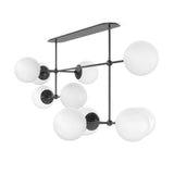 Featuring Armstrong Black Gunmetal Opal Matte Glass Linear Chandelier by Four Hands at Amethyst Home. Matte glass spheres seem to extend and reach across smooth brass rods. Each globe is individually blown, shaped and sculpted by hand through a one-hour process. Matte globes are specially manufactured to evenly diffuse light. The finish on the brass fr. Amethyst Home provides interior design, new home construction design consulting, vintage area rugs, and lighting in the Salt Lake City metro area.