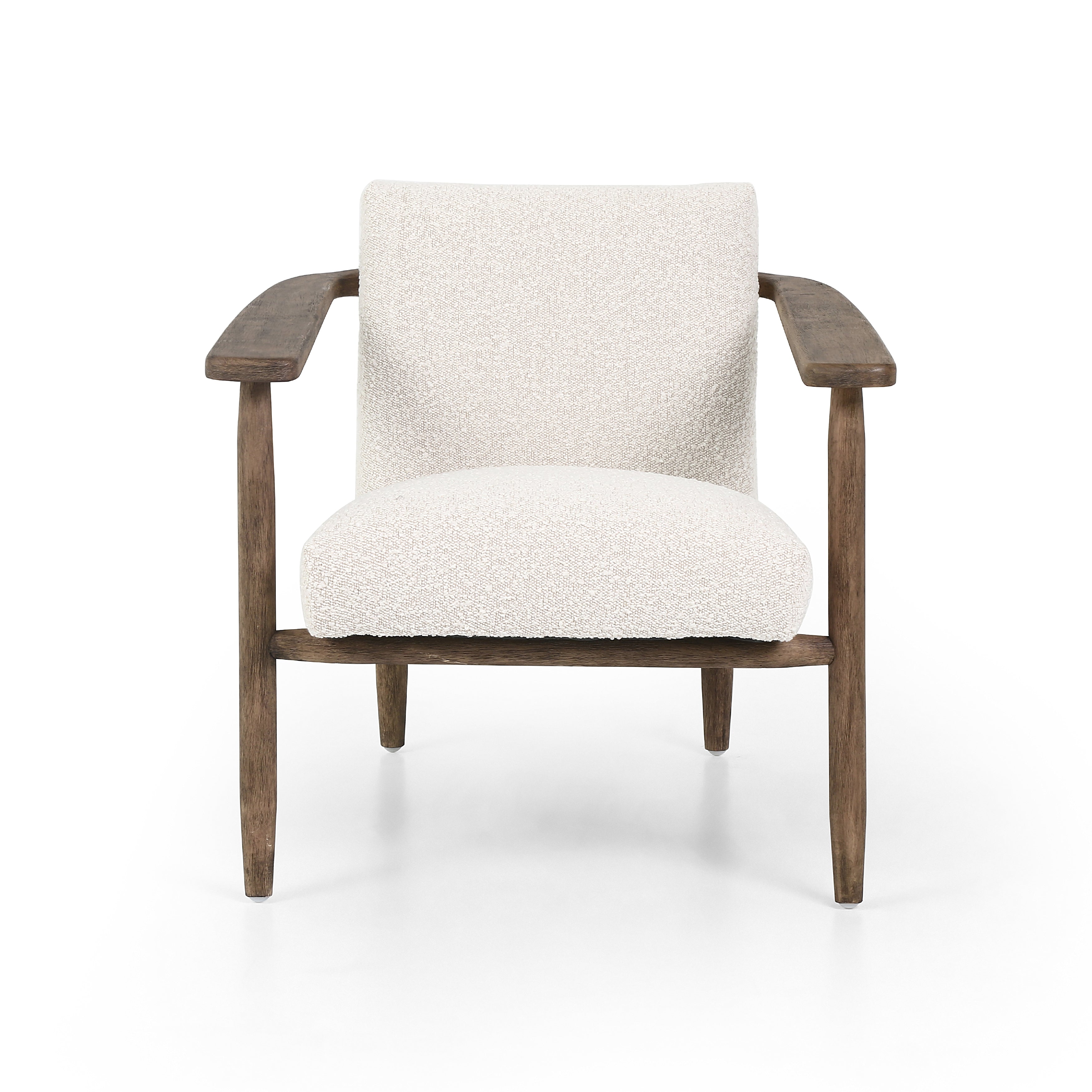 Featuring Arnett Chair by Four Hands at Amethyst Home. Textural cream boucle seating offers a sumptuous sit, with complementary wire-brushed parawood framing forming a slim U shape. Two posterior top-grain leather straps add a stylish finishing touch. Performance fabrics are specially created to withstand spills, stains, high traffic and wear, ensuring long-term comfort and unmatche. Amethyst Home provides interior design, new construction, custom furniture and area rugs in the Monterey metro area