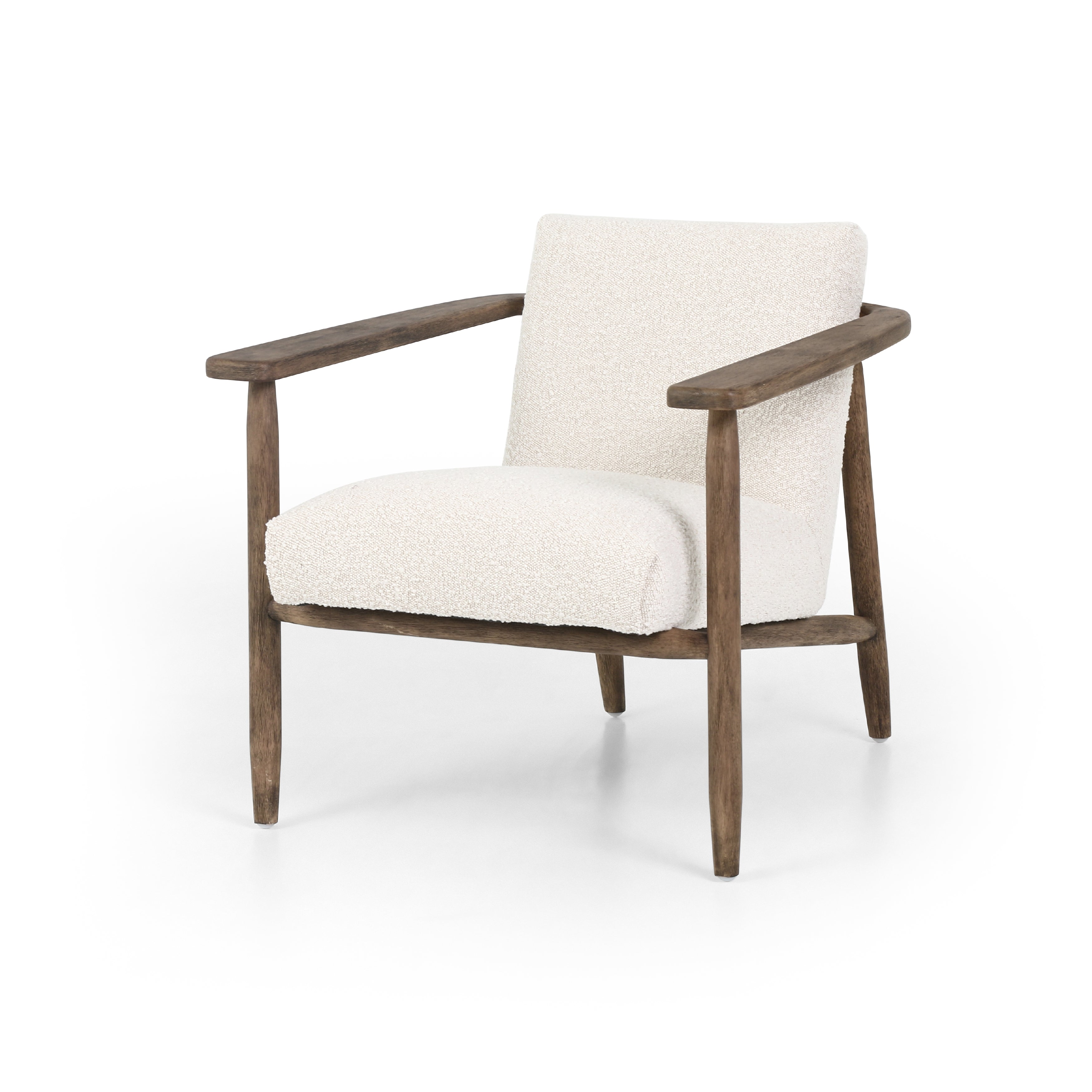 Featuring Arnett Chair by Four Hands at Amethyst Home. Textural cream boucle seating offers a sumptuous sit, with complementary wire-brushed parawood framing forming a slim U shape. Two posterior top-grain leather straps add a stylish finishing touch. Performance fabrics are specially created to withstand spills, stains, high traffic and wear, ensuring long-term comfort and unmatch. Amethyst Home provides interior design, new construction, custom furniture and area rugs in the San Diego metro area