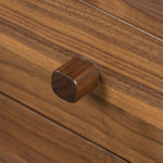 Inspired by campaign-style furniture of the 1800s â€” packable pieces first designed for traveling military use â€” a simply shaped nightstand of natural walnut features a subtly inset top and rounded legs, finished with wooden hardware Amethyst Home provides interior design, new home construction design consulting, vintage area rugs, and lighting in the Tampa metro area.