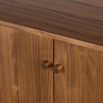 Inspired by campaign-style furniture of the 1800s â€” packable pieces first designed for traveling military use â€” a simply shaped sideboard of natural walnut features a subtly inset top and rounded legs, finished with wooden hardware Amethyst Home provides interior design, new home construction design consulting, vintage area rugs, and lighting in the Des Moines metro area.
