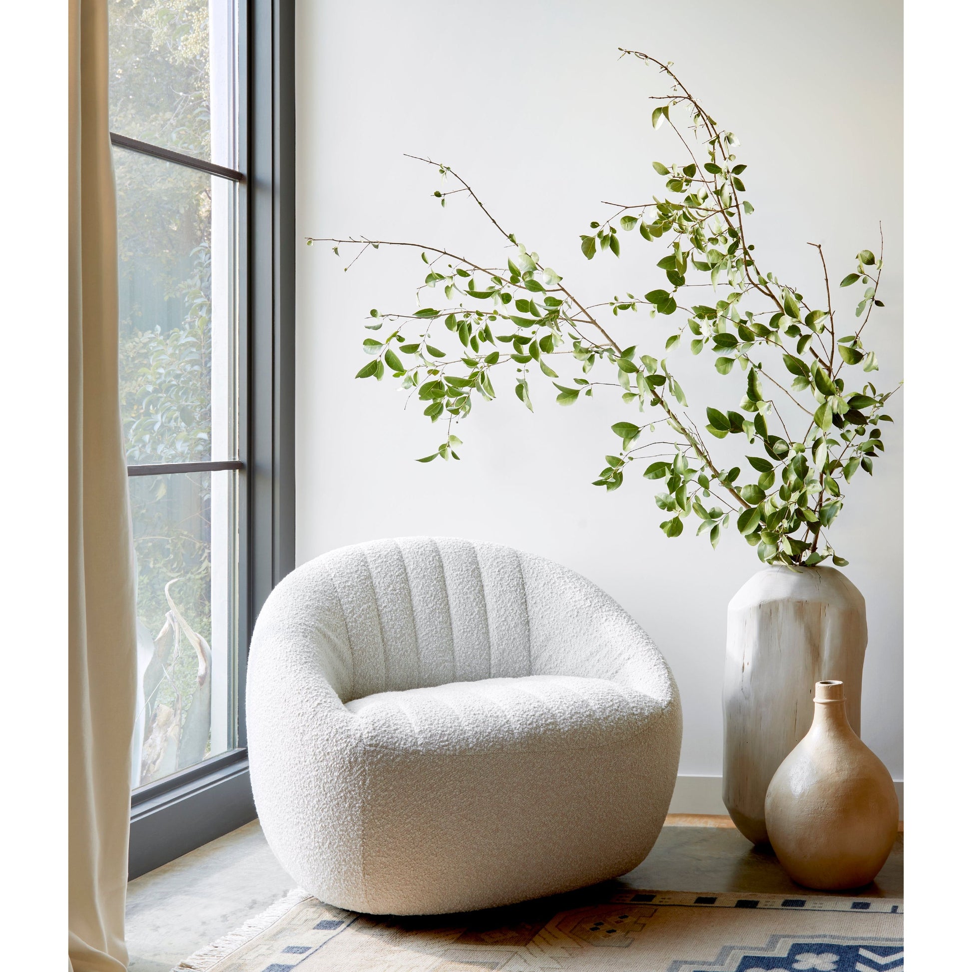 The Audie Knoll Natural Swivel Chair's performance fabrics are specially created to withstand spills, stains, high traffic and wear, ensuring long-term comfort and unmatched durability. Amethyst Home provides interior design services, furniture, rugs, and lighting in the Austin metro area.