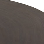 Natural beauty, total novelty. Oyster-cut Guanacaste forms a petite, kidney-shaped coffee table. Visible rings speak to woods' natural graining, while a dark gunmetal-finished base provides clean contrast to the whole look. Option to pair with taller piece, sold separately. Amethyst Home provides interior design, new construction, custom furniture, and area rugs in the Portland metro area.
