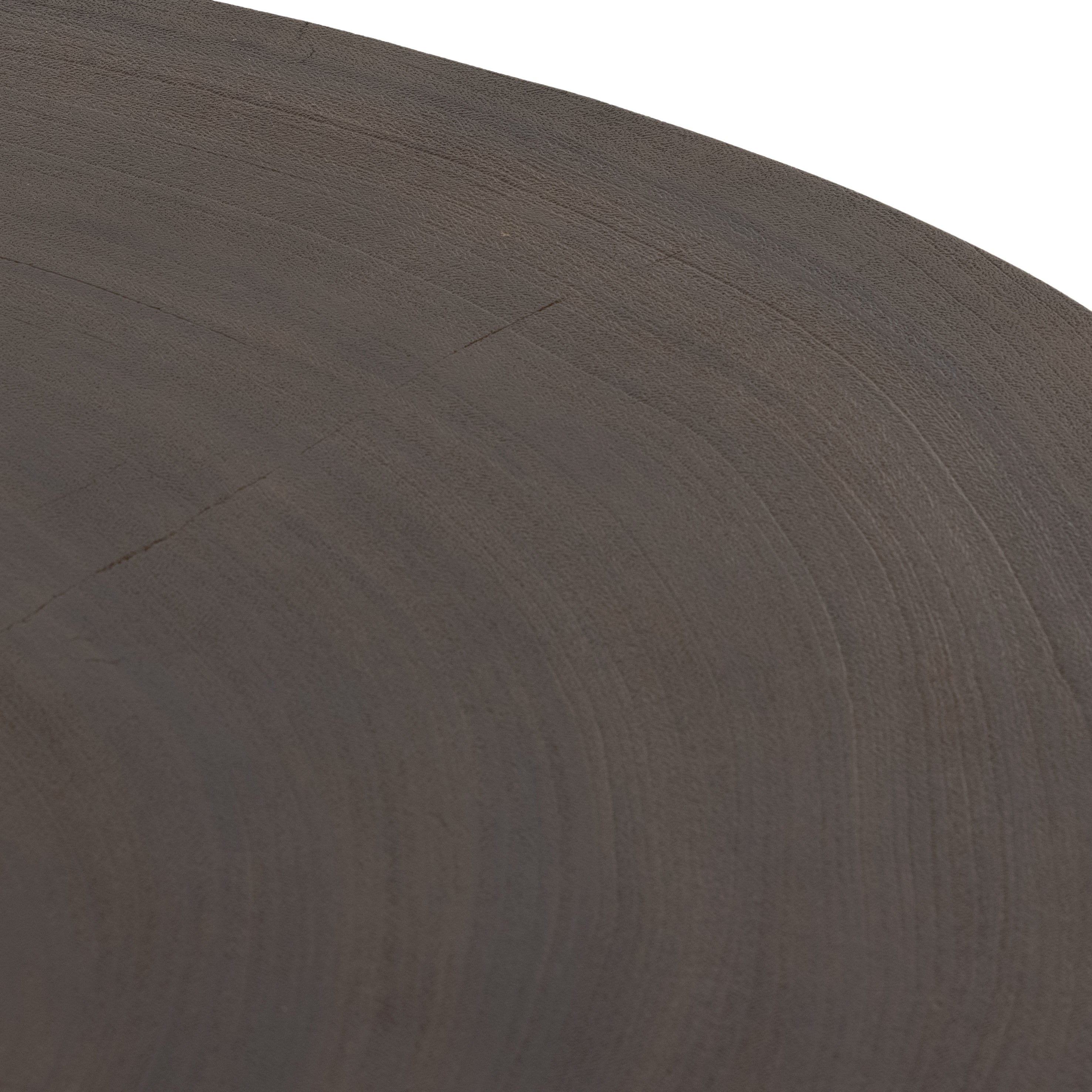 Natural beauty, total novelty. Oyster-cut Guanacaste forms a petite, kidney-shaped coffee table. Visible rings speak to woods' natural graining, while a dark gunmetal-finished base provides clean contrast to the whole look. Option to pair with taller piece, sold separately. Amethyst Home provides interior design, new construction, custom furniture, and area rugs in the Portland metro area.