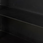 Display barware, books and keepsakes in wide, beautifully arched cabinetry. Solid iron sheeting is finished in a soft, matte black with contrasting brass hardware. Amethyst Home provides interior design, new construction, custom furniture, and area rugs in the Newport Beach metro area.
