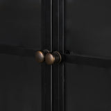 Display barware, books and keepsakes in wide, beautifully arched cabinetry. Solid iron sheeting is finished in a soft, matte black with contrasting brass hardware. Amethyst Home provides interior design, new construction, custom furniture, and area rugs in the San Diego metro area.