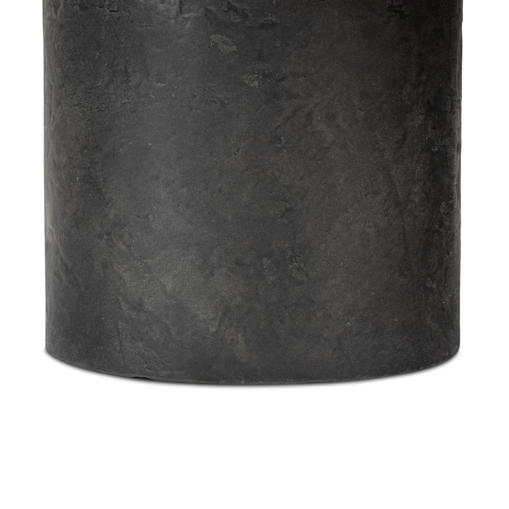 Featuring Bonnie Textured Black Concrete Coffee Table by Four Hands at Amethyst Home. A cylindrical pedestal base delivers a touch of softness to a a heavily textured tabletop of slate-like concrete.Collection: ChandlerColors: Textured Black ConcreteMaterials: Concrete Weight: 72.75 lbs. Amethyst Home provides interior design, new home construction design consulting, vintage area rugs, and lighting in the San Diego metro area.