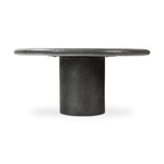 Featuring Bonnie Textured Black Concrete Coffee Table by Four Hands at Amethyst Home. A cylindrical pedestal base delivers a touch of softness to a a heavily textured tabletop of slate-like concrete.Collection: ChandlerColors: Textured Black ConcreteMaterials: Concrete Weight: 72.75 lbs. Amethyst Home provides interior design, new home construction design consulting, vintage area rugs, and lighting in the Washington metro area.