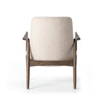 Dramatic arms and a deeper seat offer relaxation with mid-century modern sophistication. Sculpted frame adds an architectural feel to light camel upholstery. Amethyst Home provides interior design, new construction, custom furniture, and area rugs in the Los Angeles metro area.