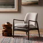 Dramatic arms and a deeper seat offer relaxation with mid-century modern sophistication. Sculpted frame adds an architectural feel to light camel upholstery. Amethyst Home provides interior design, new construction, custom furniture, and area rugs in the Washington metro area.