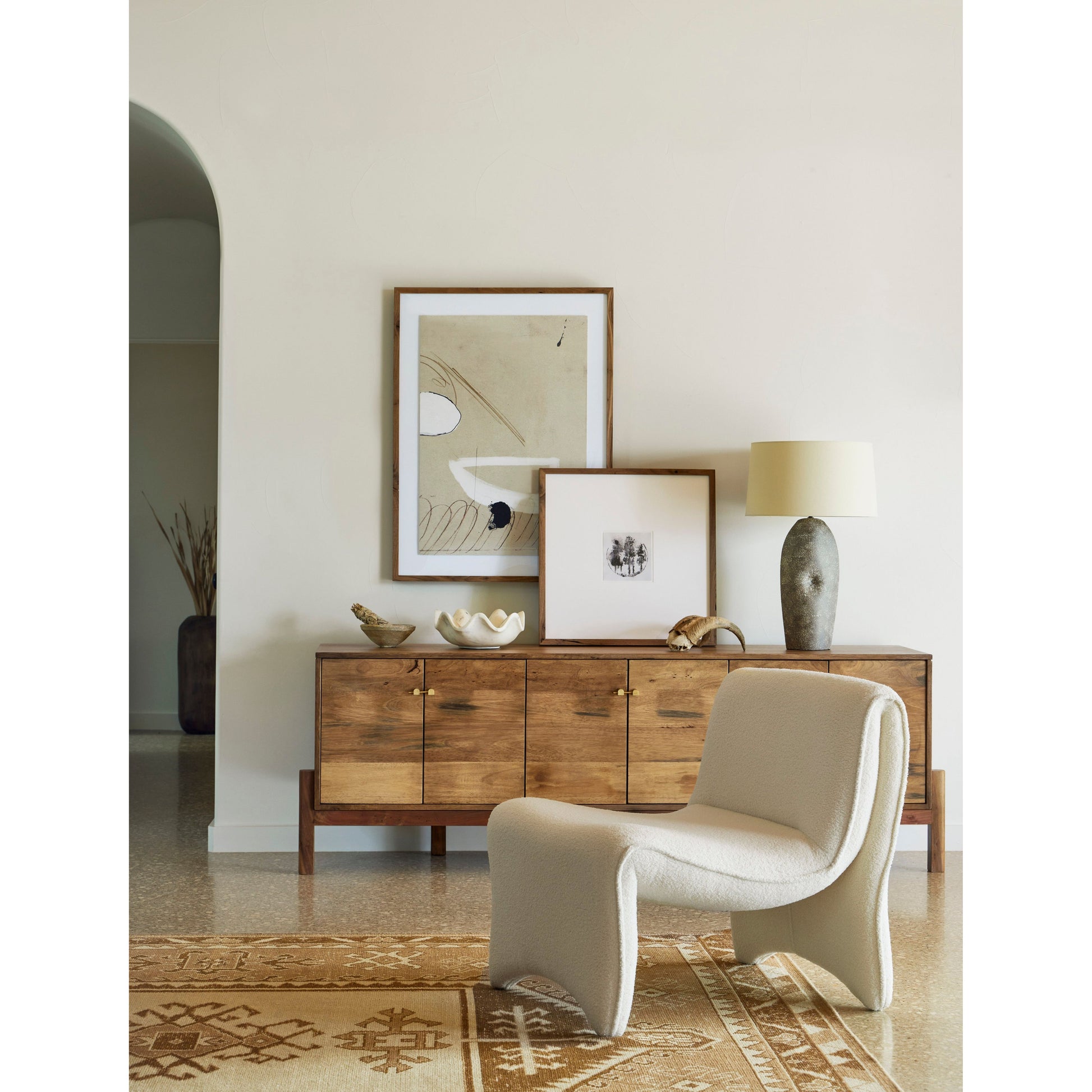 Fashion and function meet to create one inviting seat. The fluid lines of this chair are right on trend. And a micro shearling performance fabric , which happens to be liquid-repellent, adds an extra layer of softness and durability. Amethyst Home provides interior design services, furniture, rugs, and lighting in the Dallas metro area.