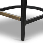 Featuring Britt Brushed Ebony with Savile Flax Stool by Four Hands at Amethyst Home. Mixed materials refresh retro styling. Brushed ebony nettlewood frames a textural inlay of natural cane for beautifully crisp contrast. Fastened by Velcro, light, linen-blend seating of high-performance fabric brings modern sensibility to the counter. Performance fabrics ar. Amethyst Home provides interior design, new home construction design consulting, vintage area rugs, and lighting in the Charlotte metro area.