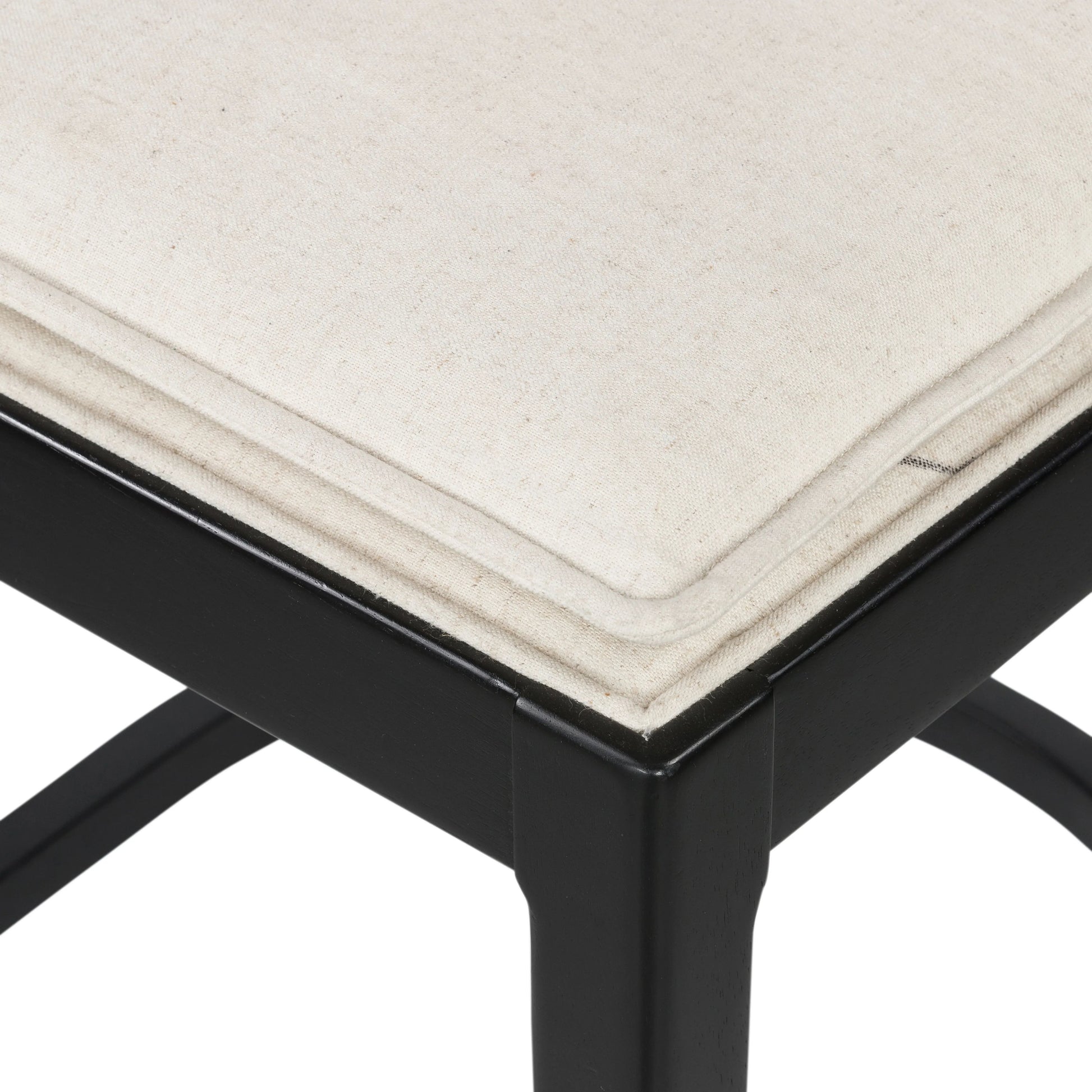 Mixed materials refresh retro styling. Brushed ebony nettlewood frames a textural inlay of natural cane for beautifully crisp contrast. Fastened by Velcro, light, linen-blend seating of high-performance fabric brings modern sensibility to the counter. Amethyst Home provides interior design, new home construction design consulting, vintage area rugs, and lighting in the Dallas metro area.