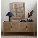 Monochromatic with a textural twist. Natural mango frames woven cane fronts, with black iron hardware for subtle contrast. Inside, spacious shelving awaits storage of dinnerware and more Amethyst Home provides interior design, new home construction design consulting, vintage area rugs, and lighting in the Los Angeles metro area.