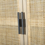 Monochromatic with a textural twist. Natural mango frames woven cane fronts, with black iron hardware for subtle contrast. Inside, spacious shelving awaits storage of dinnerware and more Amethyst Home provides interior design, new home construction design consulting, vintage area rugs, and lighting in the Tampa metro area.