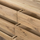 Designed by Thomas Bina and Ronald Sasson, a design partnership blending both modern minimalist and Brazilian influences. This grand-scale dresser is crafted from natural reclaimed French oak with plenty of graining, cracking and movement across the drawer fronts. Detailed with angled legs and exposed joinery on the top. Amethyst Home provides interior design, new home construction design consulting, vintage area rugs, and lighting in the Kansas City metro area.