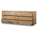 Designed by Thomas Bina and Ronald Sasson, a design partnership blending both modern minimalist and Brazilian influences. This grand-scale dresser is crafted from natural reclaimed French oak with plenty of graining, cracking and movement across the drawer fronts. Detailed with angled legs and exposed joinery on the top. Amethyst Home provides interior design, new home construction design consulting, vintage area rugs, and lighting in the Park City metro area.