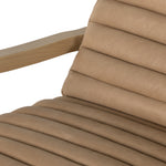 A dramatically shaped midcentury silhouette, modernized with channel tufting. Upholstered in a nude hue top-grain leather with natural whitewashed ash framing for a clean, monochromatic look. A push recliner takes this forward-thinking lounger to the next level. Amethyst Home provides interior design, new construction, custom furniture, and area rugs in the Kansas City metro area.