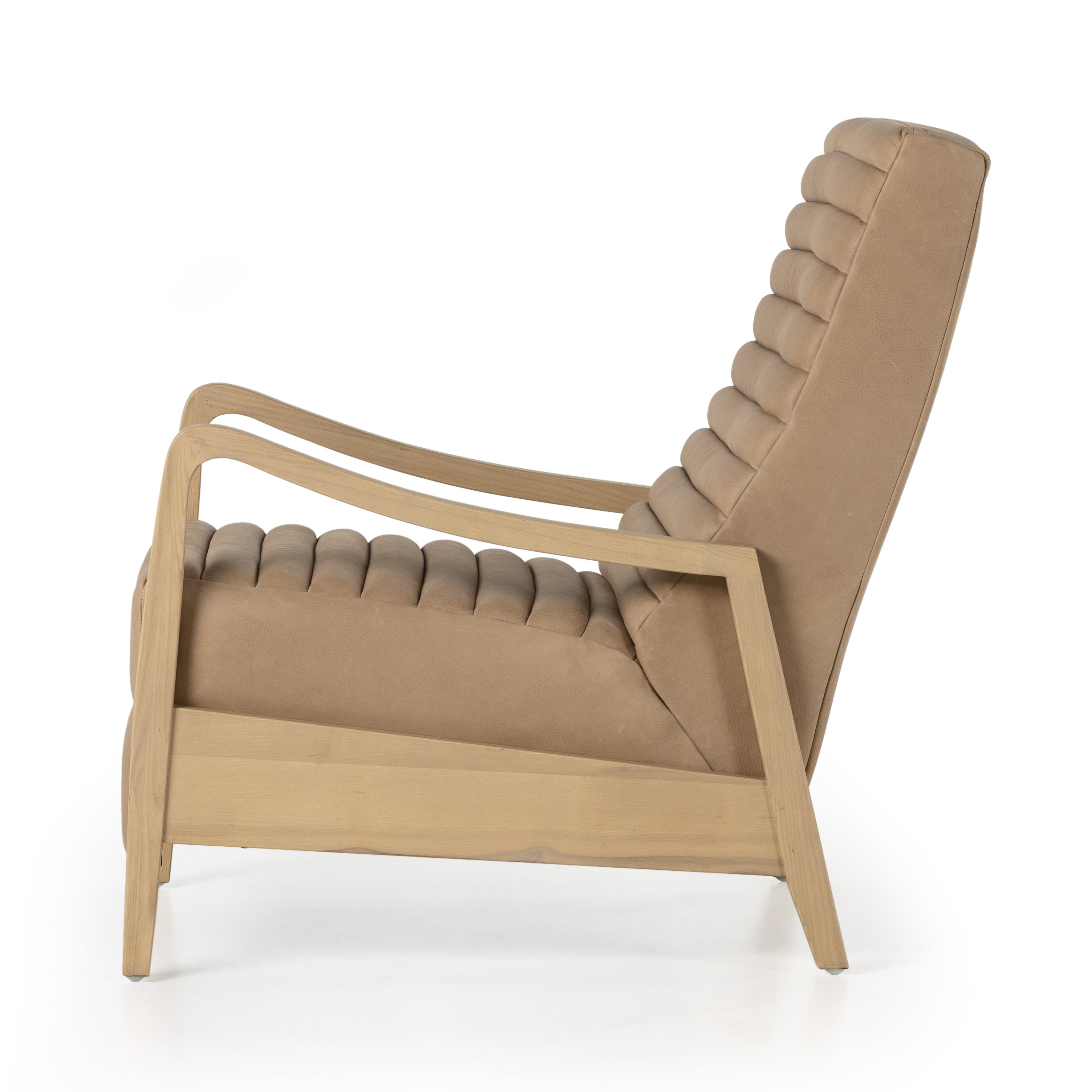 A dramatically shaped midcentury silhouette, modernized with channel tufting. Upholstered in a nude hue top-grain leather with natural whitewashed ash framing for a clean, monochromatic look. A push recliner takes this forward-thinking lounger to the next level. Amethyst Home provides interior design, new construction, custom furniture, and area rugs in the Portland metro area.
