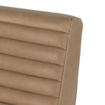 A dramatically shaped midcentury silhouette, modernized with channel tufting. Upholstered in a nude hue top-grain leather with natural whitewashed ash framing for a clean, monochromatic look. A push recliner takes this forward-thinking lounger to the next level. Amethyst Home provides interior design, new construction, custom furniture, and area rugs in the Scottsdale metro area.
