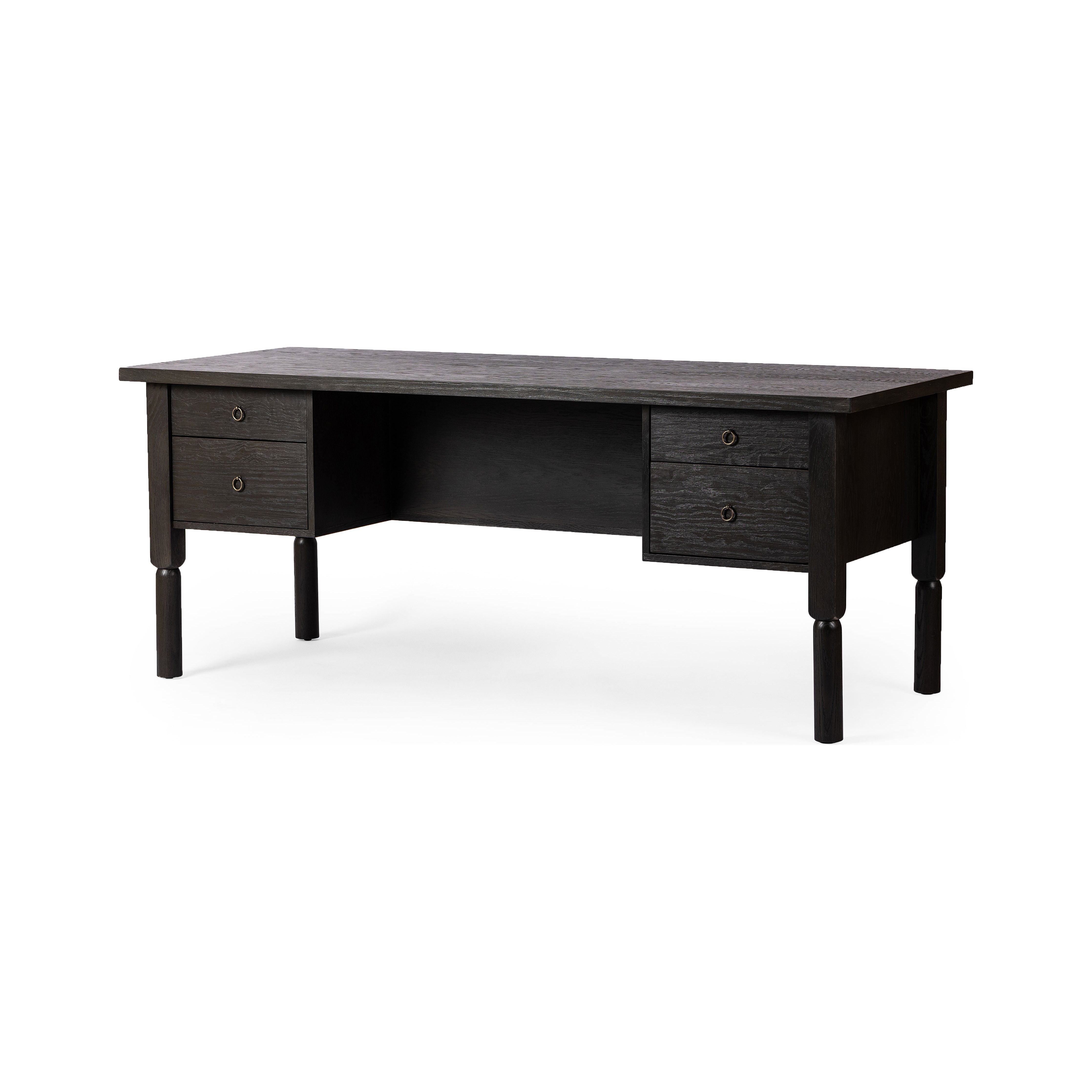 Made from oak veneer with a deep charcoal finish, this executive-size desk delivers ultimate storage, including four drawers on one side plus six open cubbies on the other, granting the option to float-style in a room. Partially turned legs add a design-forward finishing touch. Amethyst Home provides interior design, new construction, custom furniture, and area rugs in the Calabasas metro area.