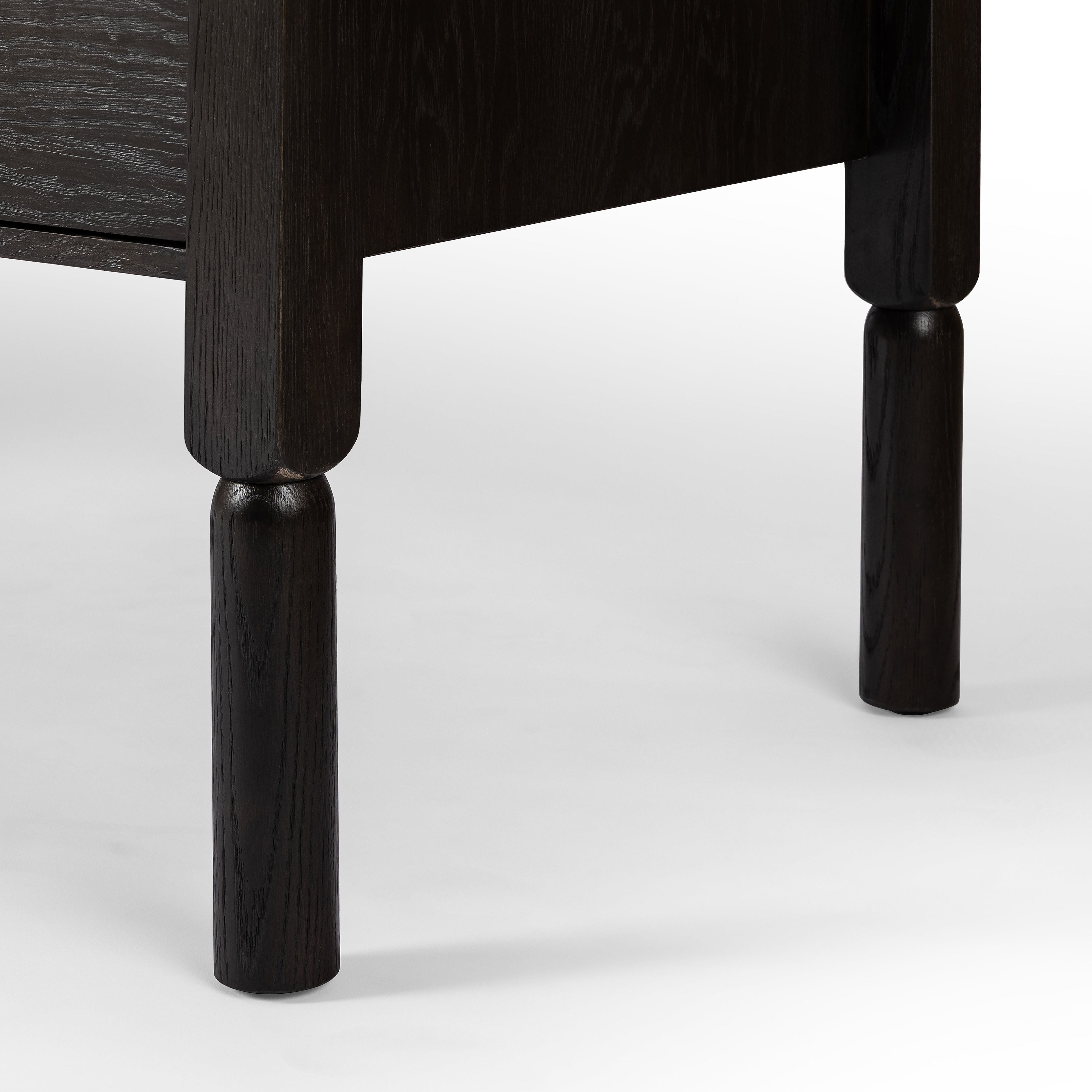 Featuring Concord Charcoal Oak Desk by Four Hands at Amethyst Home. Made from oak veneer with a deep charcoal finish, this executive-size desk delivers ultimate storage, including four drawers on one side plus six open cubbies on the other, granting the option to float-style in a room. Partially turned legs add a design-forward finishing touch.Overall Dimensions: 75"W x 30"L x. Amethyst Home provides interior design, new construction, custom furniture, and area rugs in the Laguna Beach metro area.