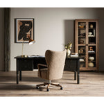 Featuring Concord Charcoal Oak Desk by Four Hands at Amethyst Home. Made from oak veneer with a deep charcoal finish, this executive-size desk delivers ultimate storage, including four drawers on one side plus six open cubbies on the other, granting the option to float-style in a room. Partially turned legs add a design-forward finishing touch.Overall Dimensions: 75"W x 30"L x 30"H
C. Amethyst Home provides interior design, new construction, custom furniture, and area rugs in the Miami metro area.