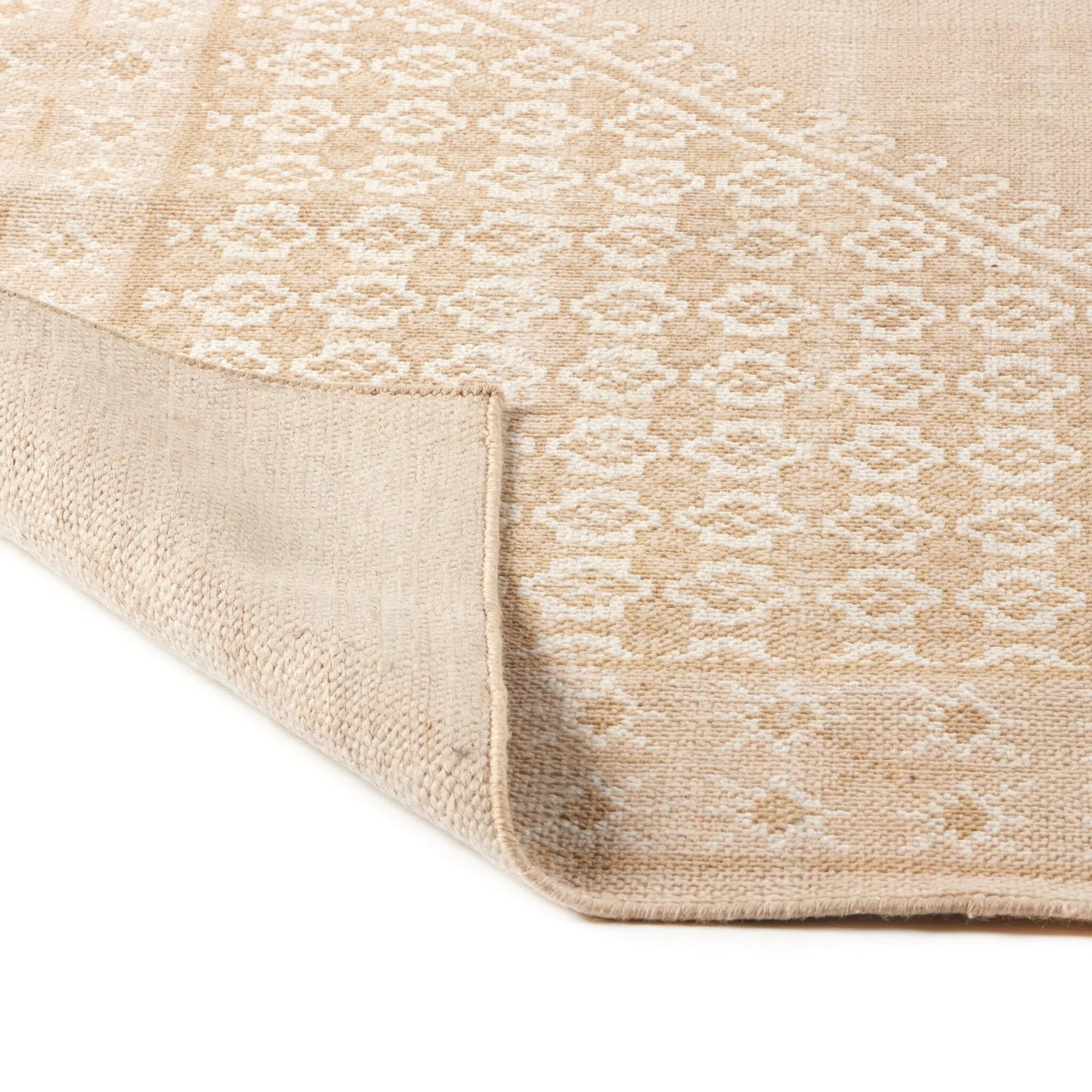Warm neutrals and intricate patterns. Following a technique and tradition dating back thousands of years, each hand-knotted rug can take two to three master weavers five to six weeks to complete, depending on the size and intricacy of each rug. Amethyst Home provides interior design, new home construction design consulting, vintage area rugs, and lighting in the Des Moines metro area.